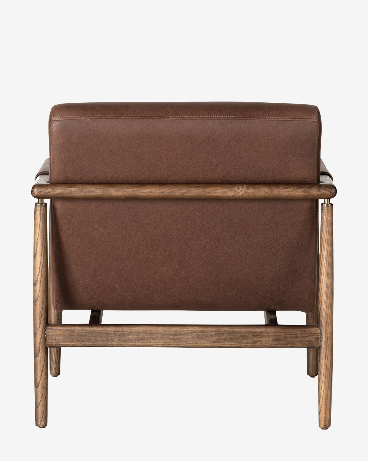 The Gaston Lounge Chair, shown from the back against a plain white background, boasts top grain leather upholstery and a sturdy solid ash frame, by McGee & Co.