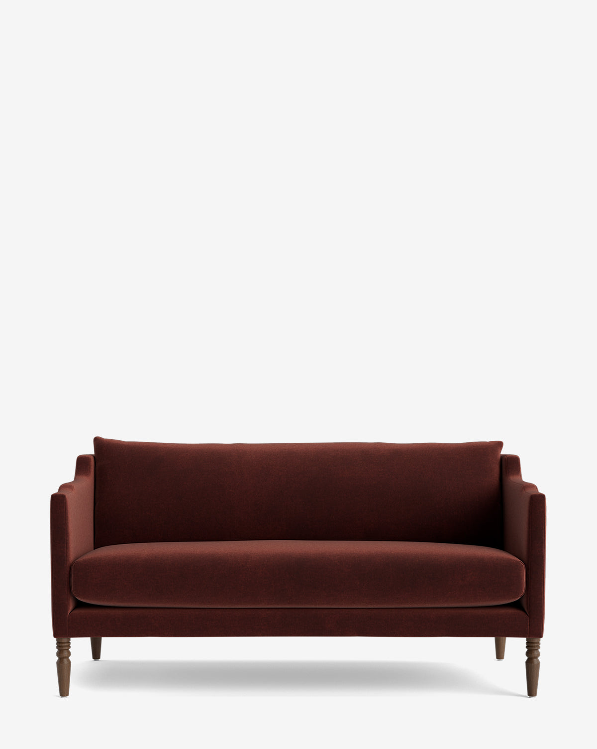 The Gemma Settee 65 showcases premium dark red upholstery, slim straight arms, and wooden legs—offering timeless style against a plain white background, by McGee & Co.