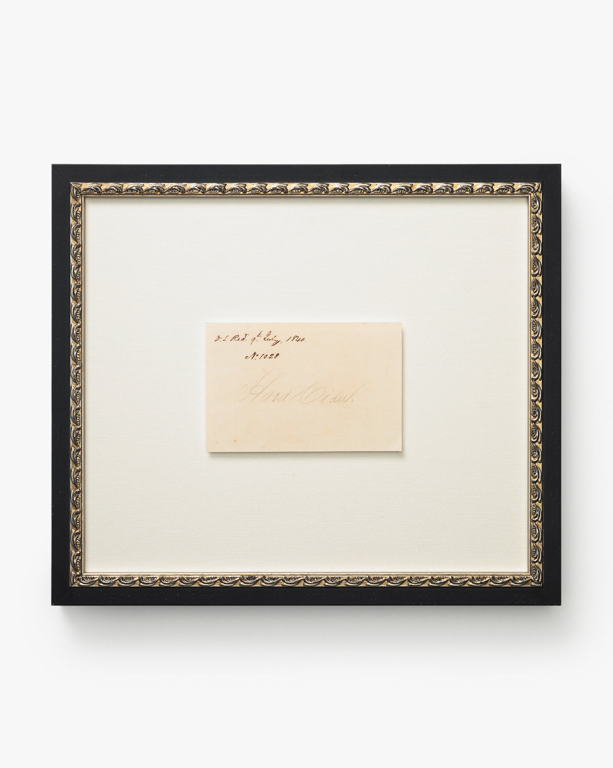 A framed, off-white Hard Cider label with elegant, faded handwriting is centered on a cream mat and surrounded by a black and gold distressed wood frame, evoking vintage charm against a white background, by McGee & Co.