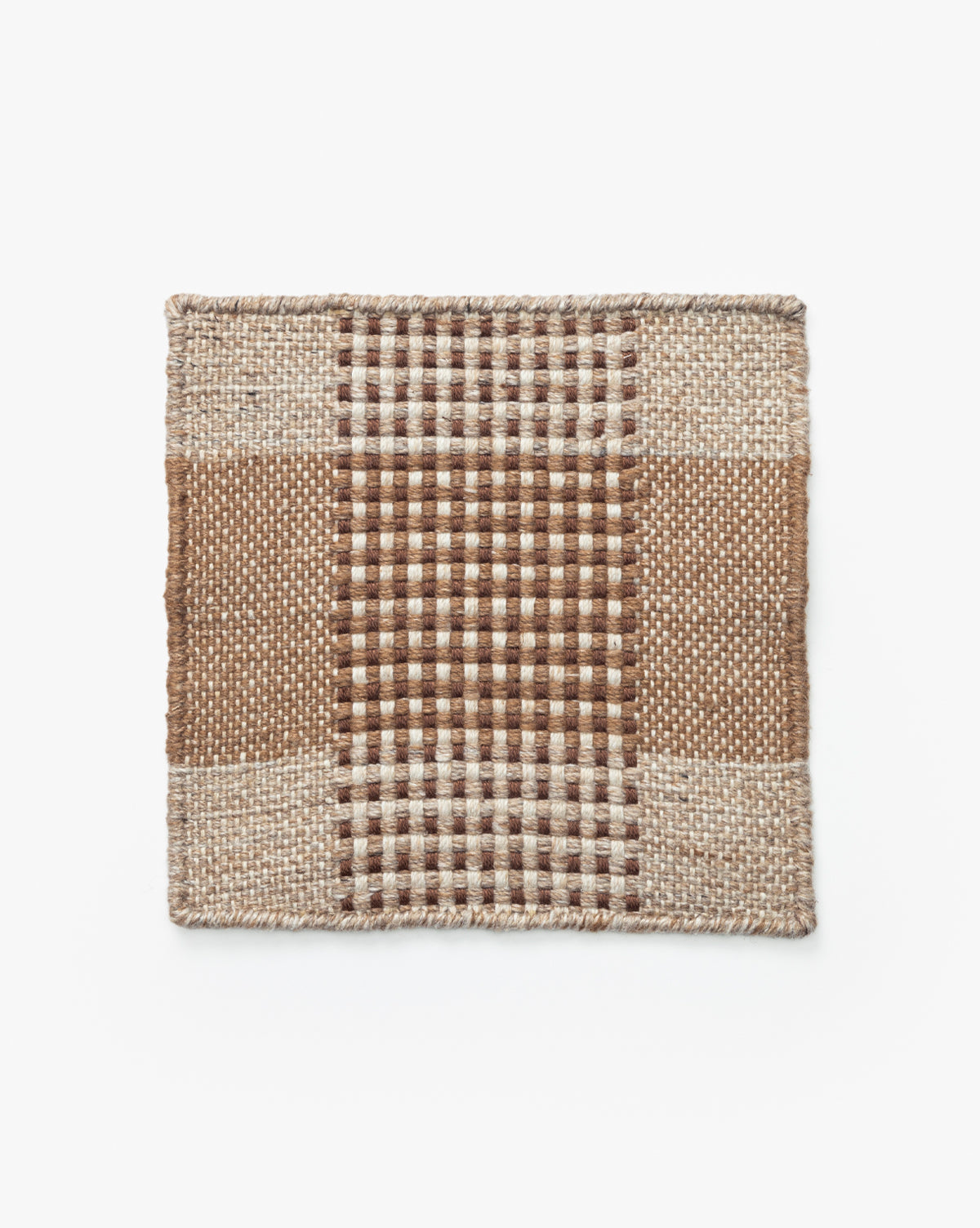 The Hargrove Indoor/Outdoor Rug Swatch features a square checker pattern in brown, beige, and tan with textured sections and visible durable PET fibers set against a white background, by McGee & Co.