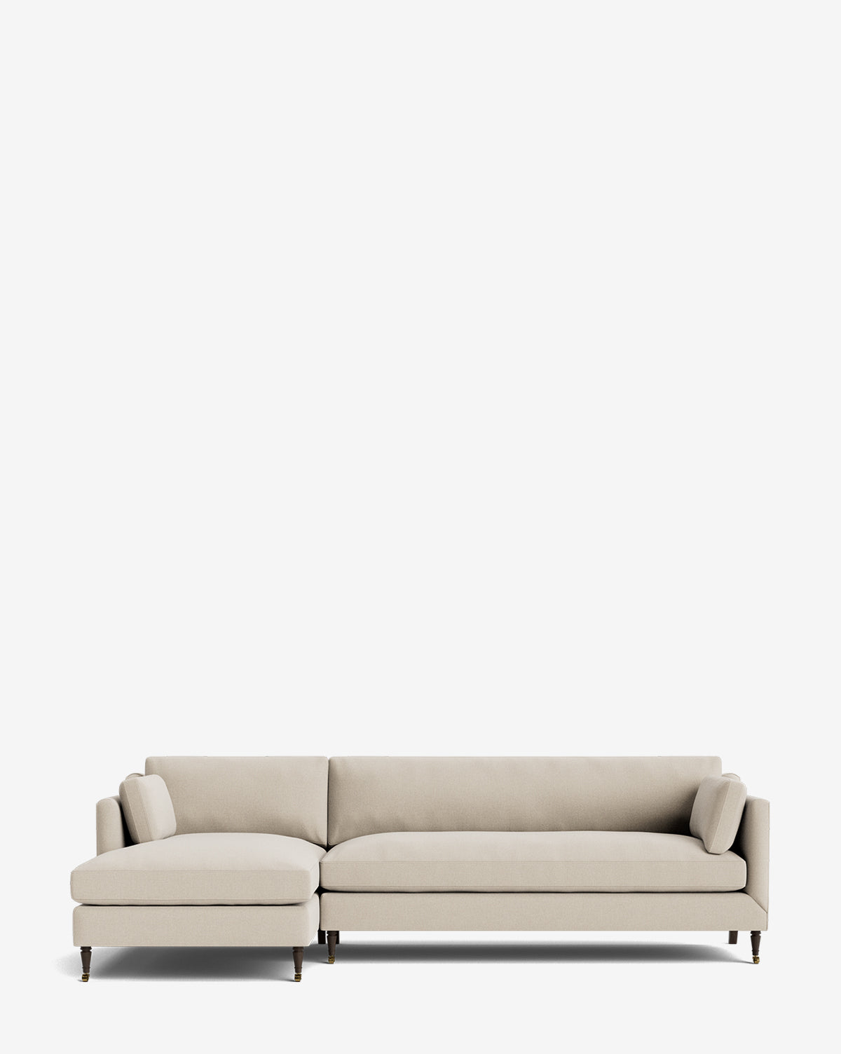 The Rowe Fine Furniture Haverford Upholstered Left Chaise Sectional features a modern light beige design, two bolster pillows, slim dark legs, and a customizable chaise—shown here against a plain white background. McGee & Co.