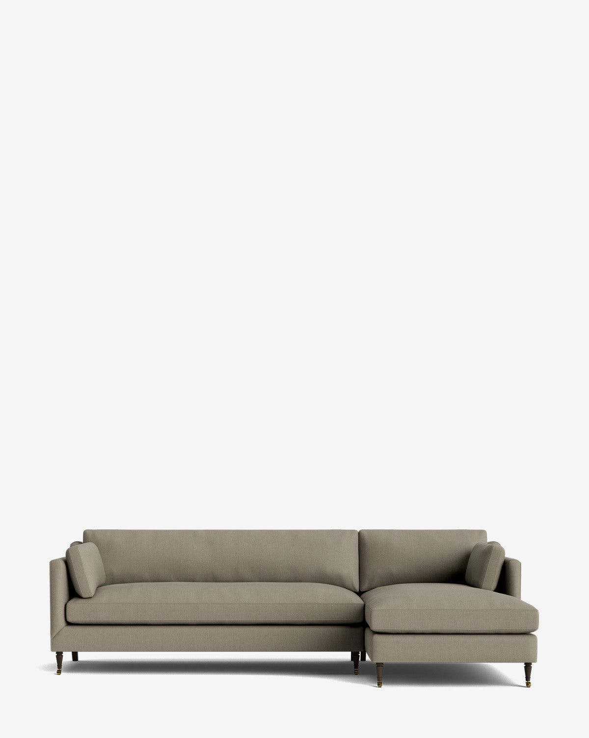 The Haverford Upholstered Right Chaise Sectional features modern light gray fabric, low arms, and wooden legs. Its right-side chaise design makes it perfect for any space and is shown here against a plain white background by McGee & Co.