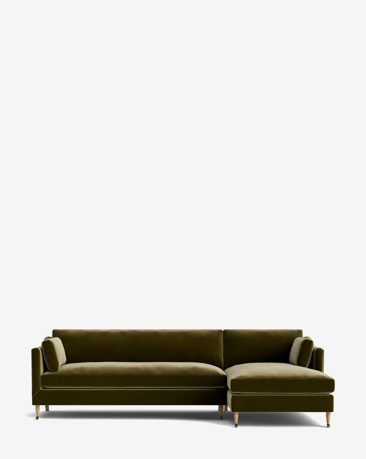 The Haverford Upholstered Right Chaise Sectional 113 is a modern olive green velvet, made-to-order sofa with two cylindrical bolster pillows and wooden legs with gold-tone caps, shown on a plain white background by McGee & Co.