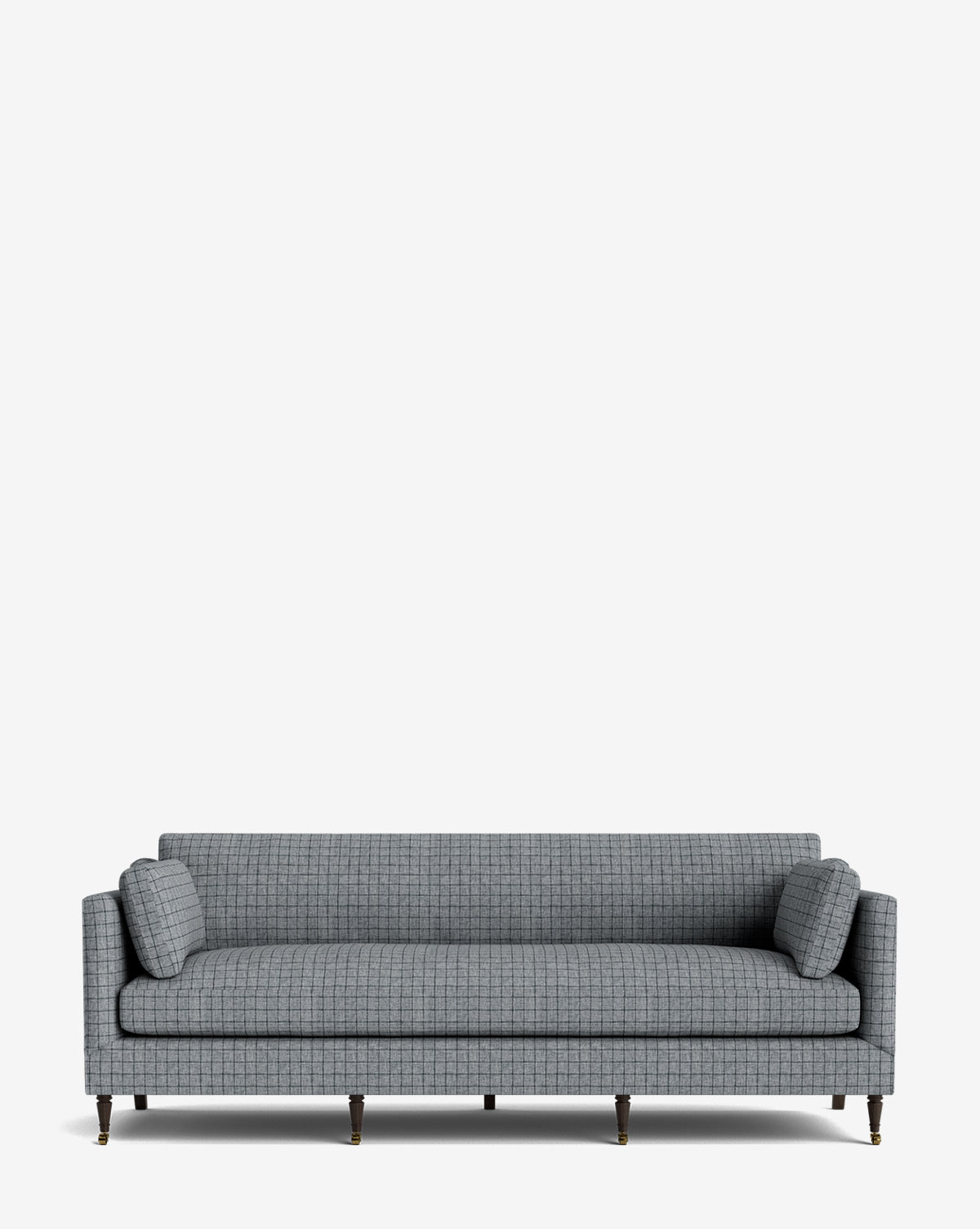 The Haverford Upholstered Sofa 90 features a modern grey checkered design, straight arms, two cylindrical bolster pillows, and four wooden legs with metal casters, displayed against a plain white background, by McGee & Co.