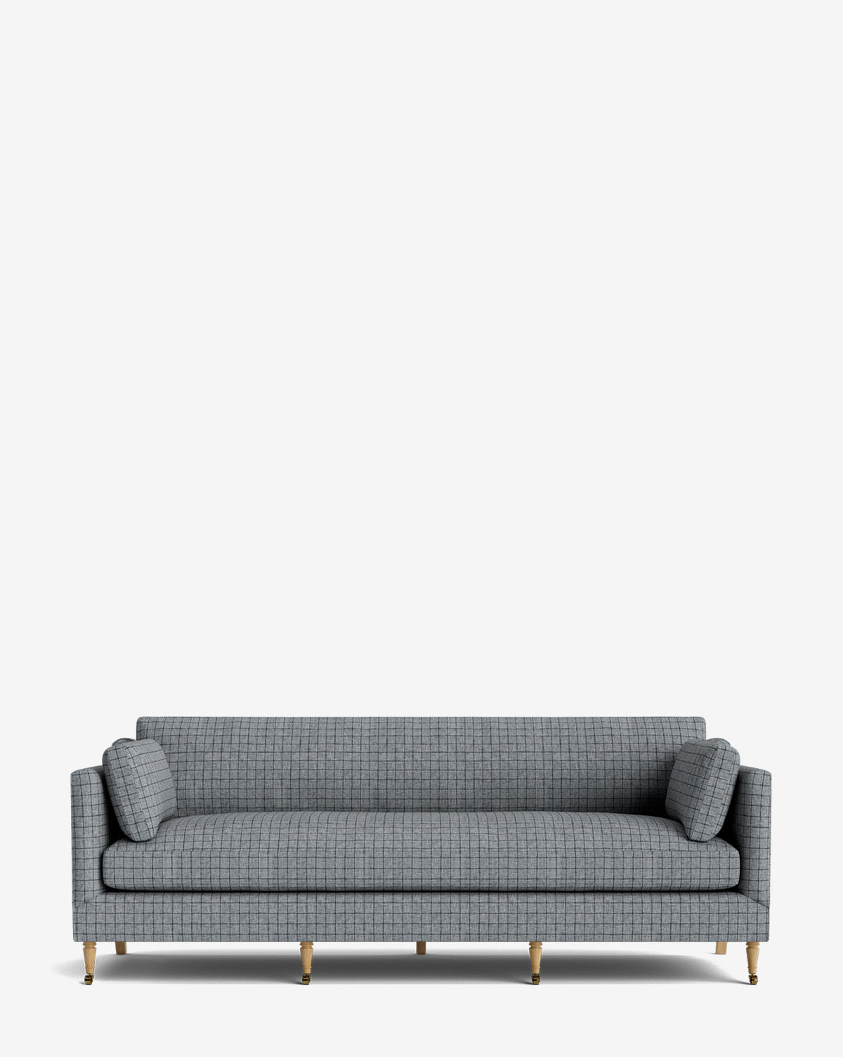 The Haverford Upholstered Sofa 90 features a modern gray checkered design, slim arms, two cylindrical bolster pillows, and six gold metal legs, shown against a plain white background by McGee & Co.