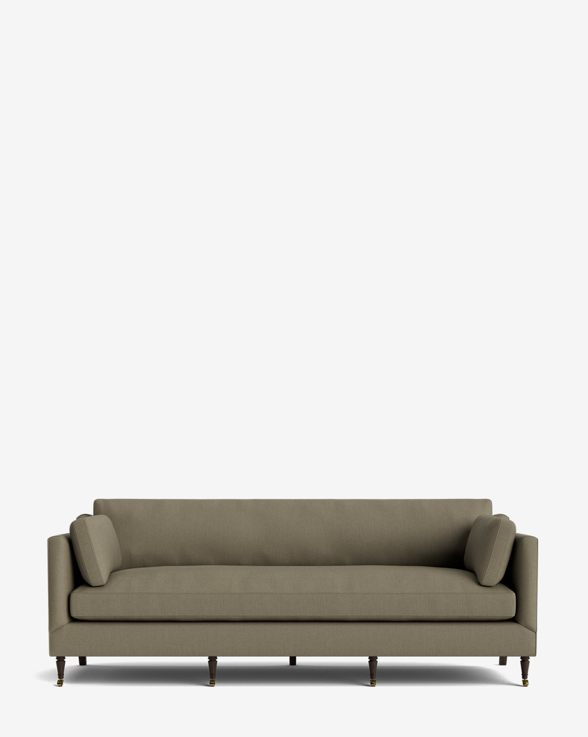 The Haverford Upholstered Sofa 90 in olive green features straight lines, brass-capped wooden legs, and two matching bolster pillows, set against a plain white background. This customizable sofa blends modern style with comfort, by McGee & Co.