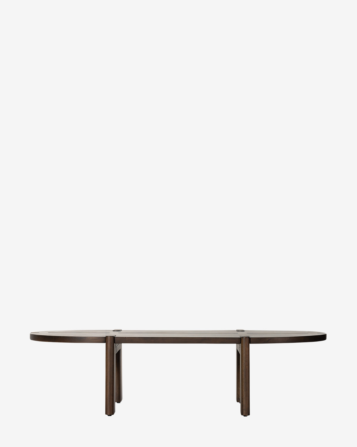 The Hawk Coffee Table features a modern, oval design crafted from solid mango wood with a flat top and four straight legs, ideal for elevating any living room. Shown here against a plain white background by McGee & Co.