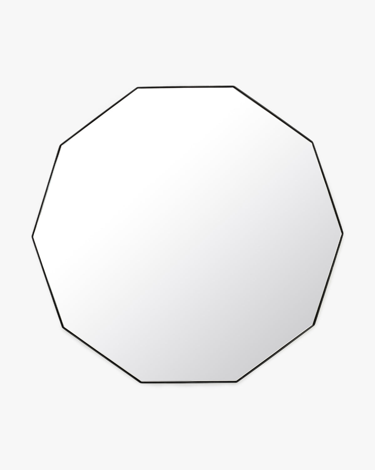 The Hawley Decagon Mirror, a large frameless wall mirror with clean edges, is displayed against a light gray background, bringing a modern touch of elegance by McGee & Co.