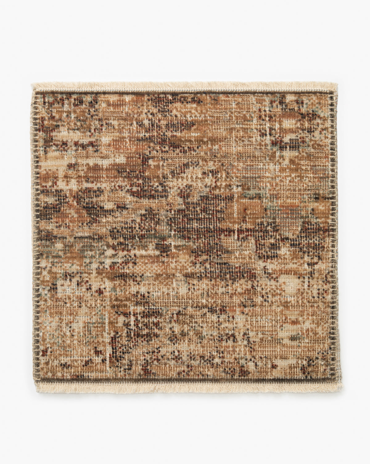 The Heatherington Neutral Rug Swatch features a rectangular shape with a mottled brown, beige, and tan pattern, cream-colored fringe on the short edges, a textured woven look, and durable high-quality construction, by McGee & Co.