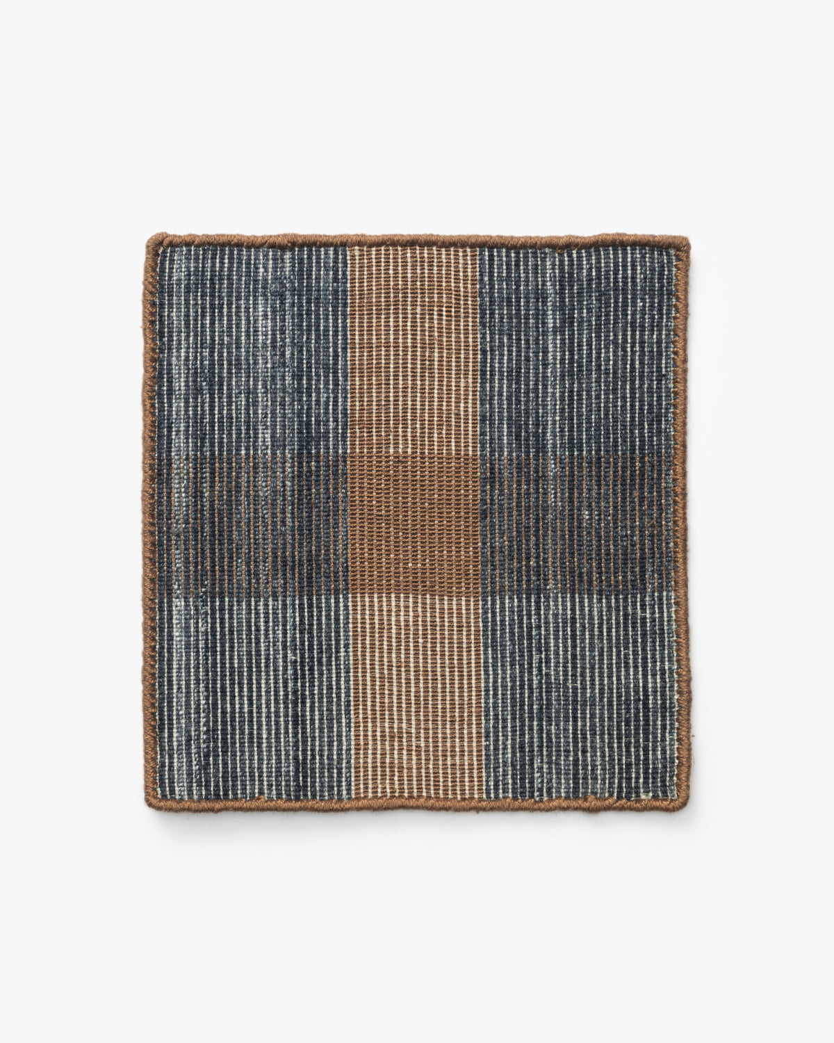 The Heriot Indoor/Outdoor Rug Swatch features a plaid pattern in navy blue, beige, and brown tones with a textured look and brown border, designed to resemble a handwoven rug for added charm, by McGee & Co.
