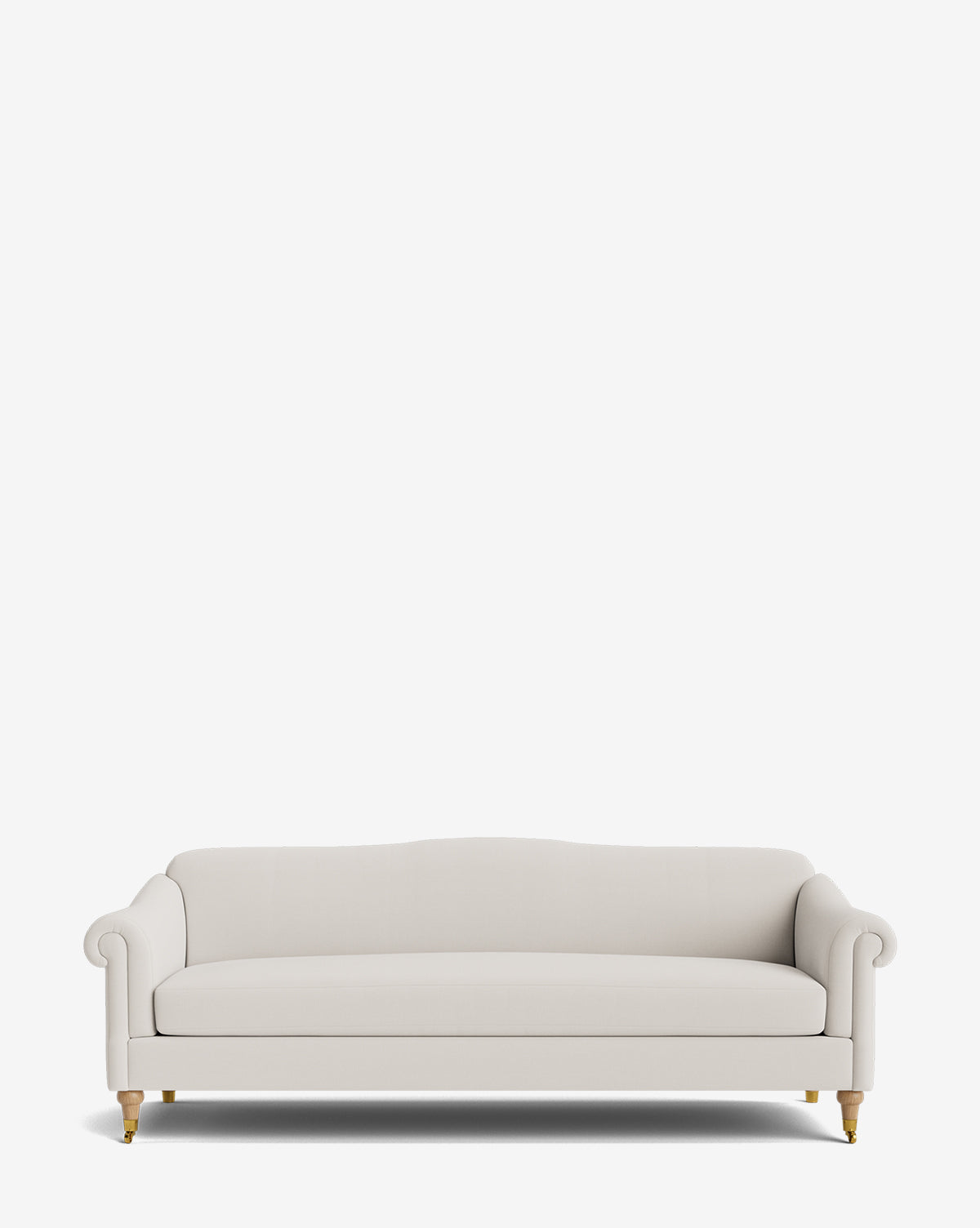 The Hildegard Sofa 90 is a customizable white upholstered sofa with rolled arms, wooden legs, and brass casters, set against a plain white background by McGee & Co.