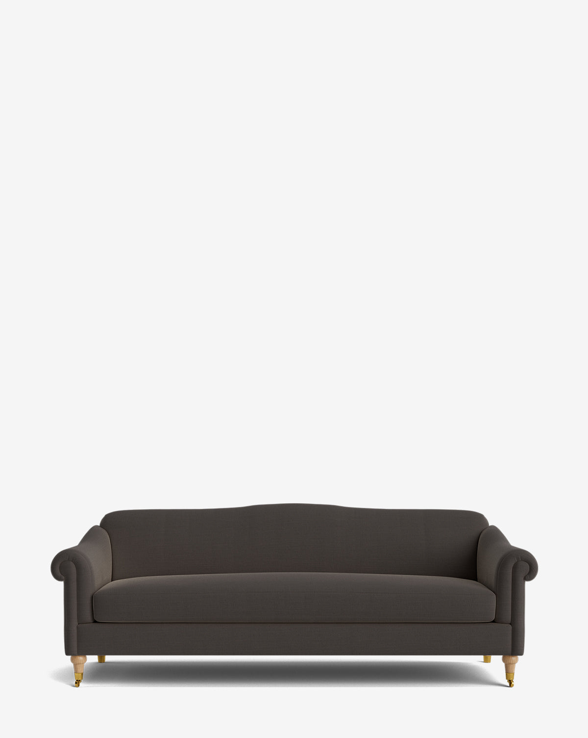The Hildegard Sofa 90 is a dark gray upholstered piece with rolled arms and wooden legs, crafted for comfort and elegance. Set against a plain white background, this handcrafted sofa enhances any living space by McGee & Co.