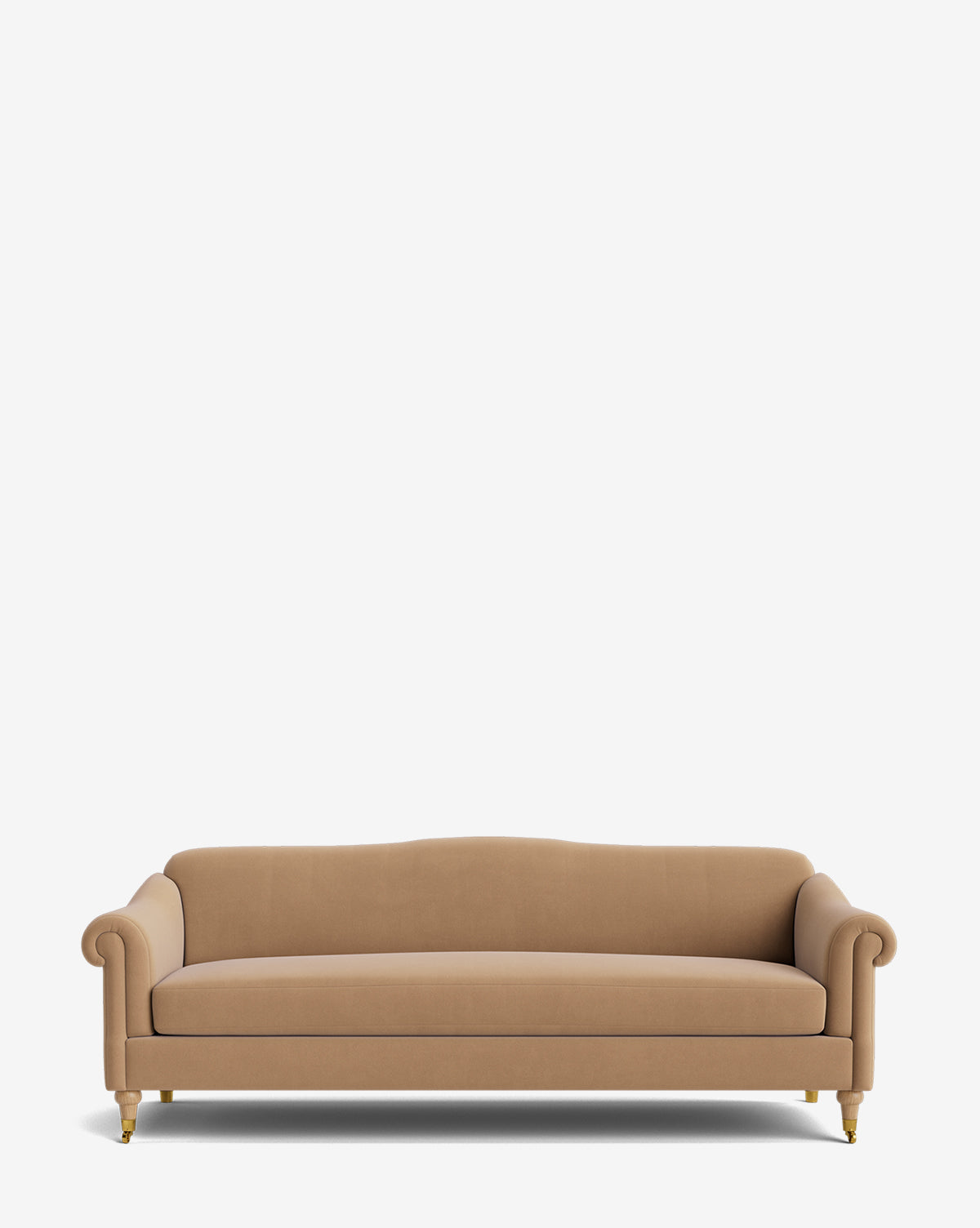 The Hildegard Sofa 90 is a tan upholstered, handcrafted sofa featuring rolled arms, a straight back, and wooden legs with brass casters, shown against a plain white background by McGee & Co.