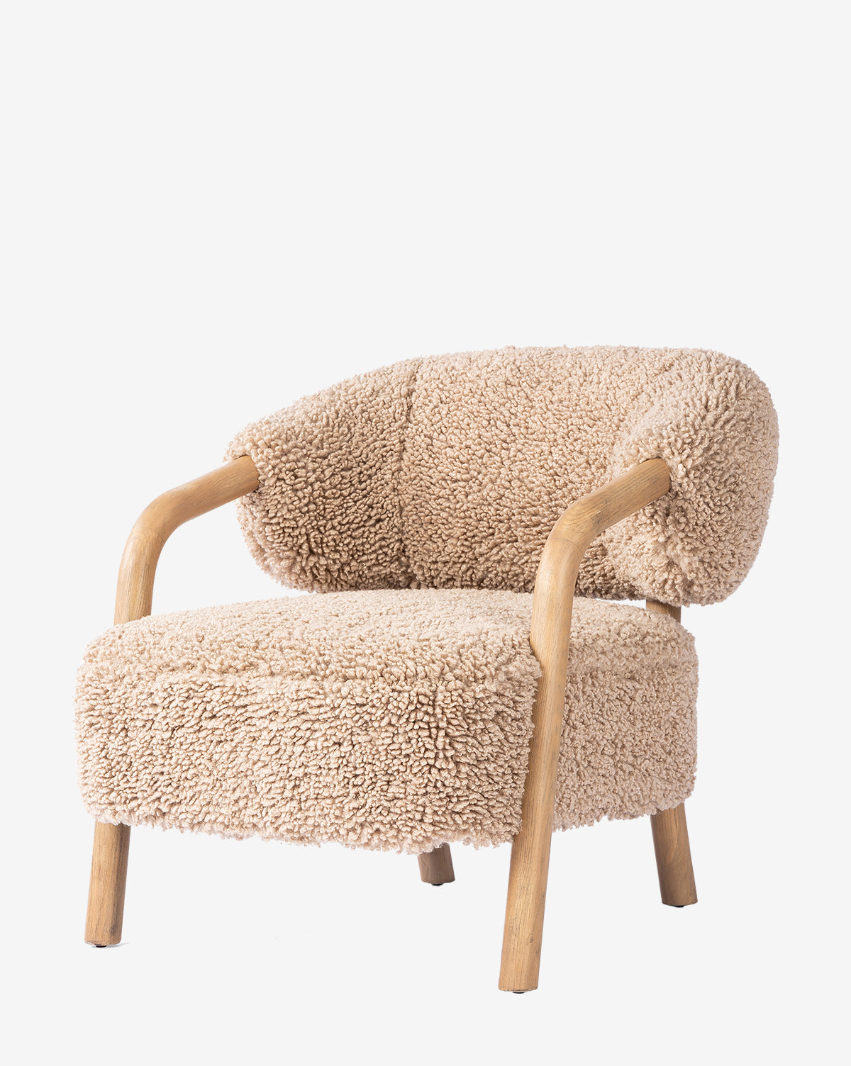 The Holstein Lounge Chair features light wooden legs and armrests, a solid oak frame, and textured beige boucle upholstery, shown against a plain white background by McGee & Co.