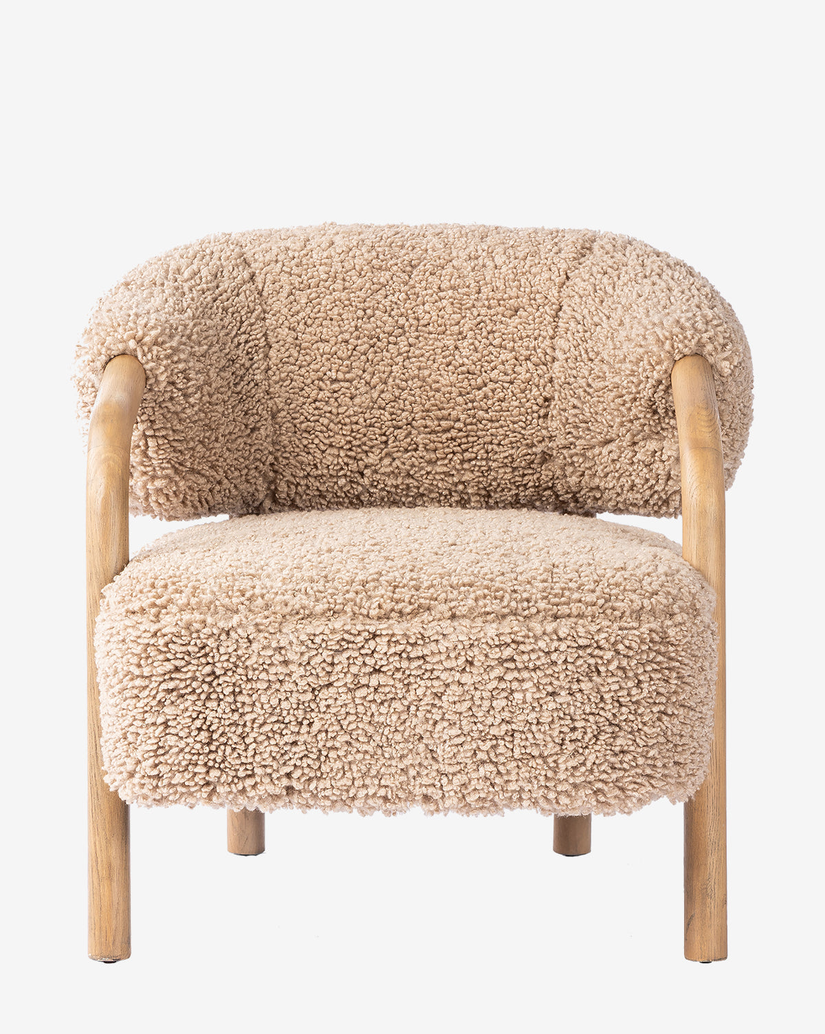 The Holstein Lounge Chair features light solid oak legs and arms, textured beige faux Mongolian shearling upholstery, a rounded back, and a plush, inviting look, by McGee & Co.