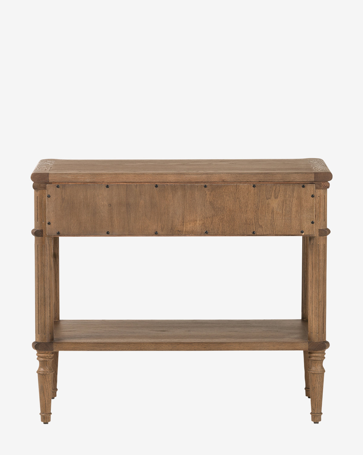 The Humphrey Nightstand features a natural wood finish, rectangular top, lower shelf, four legs, and decorative front-panel rivets. Inspired by traditional bedroom furniture, it offers a simple and classic design by McGee & Co.