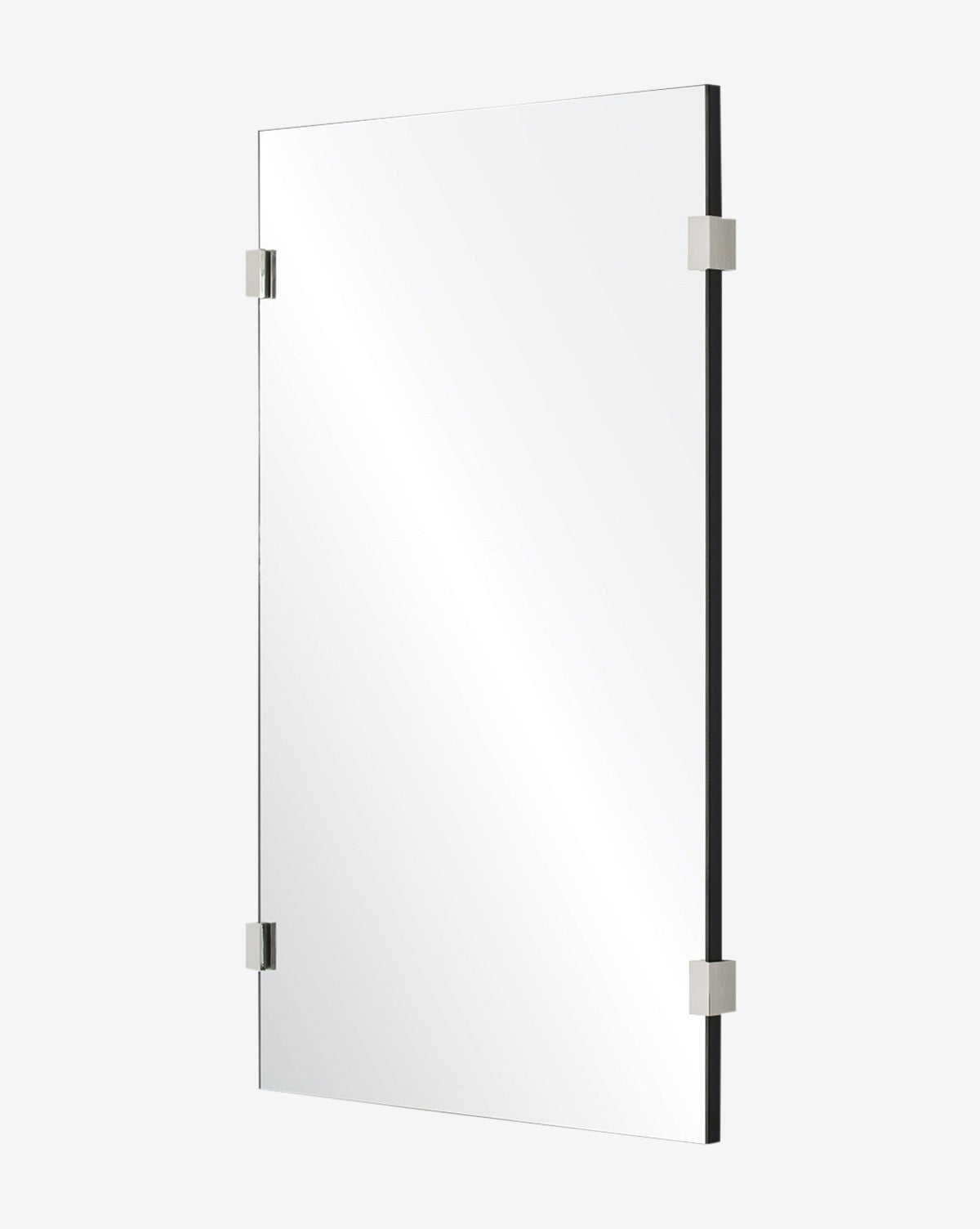 The Ivana Mirror has a modern rectangular design, with four burnished brass clips securing the glass against a plain white background, by McGee & Co.