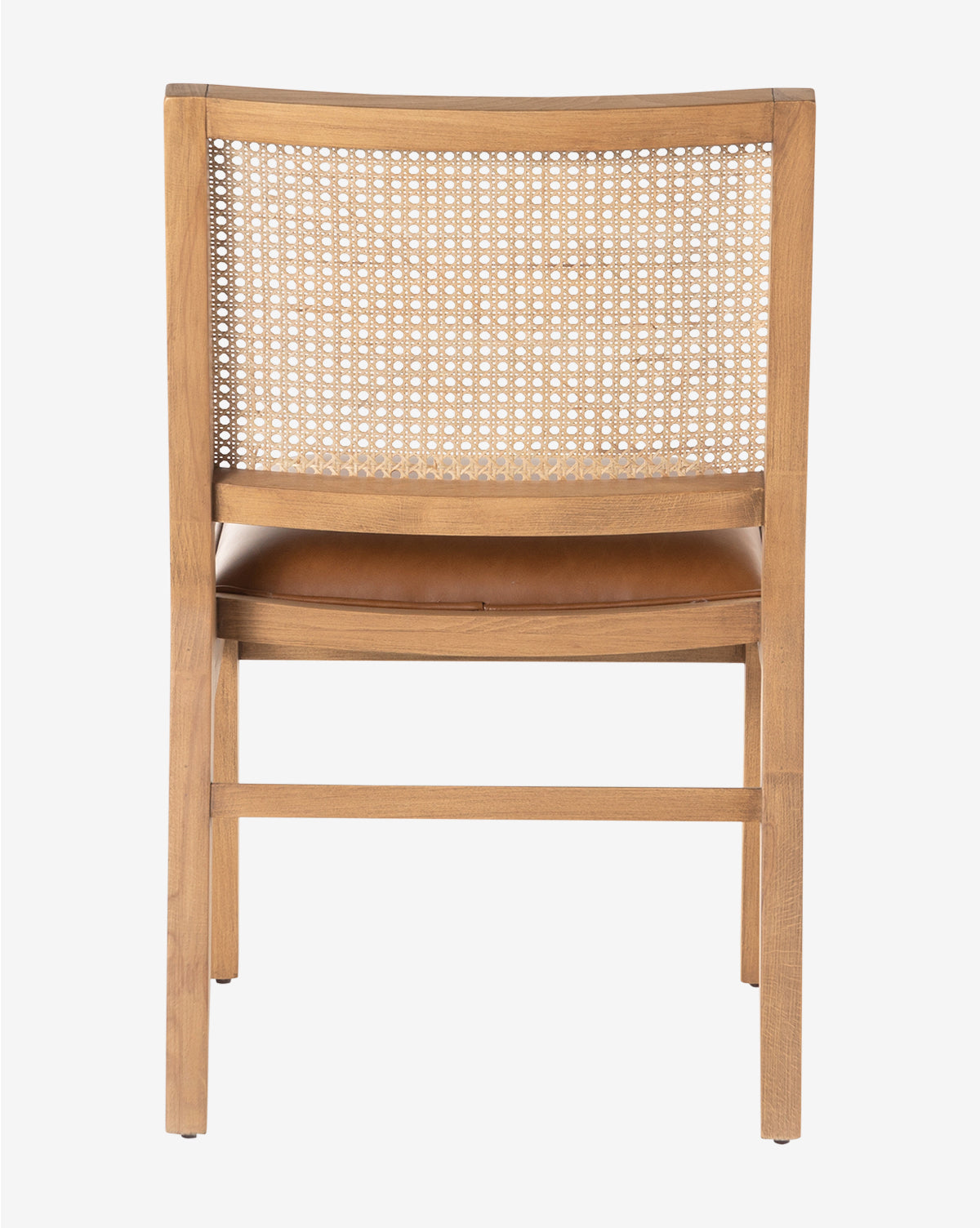 The Jett Dining Chair has a beech wood frame, woven cane backrest, and a cushioned brown leather seat, shown from the back on a white background by McGee & Co.