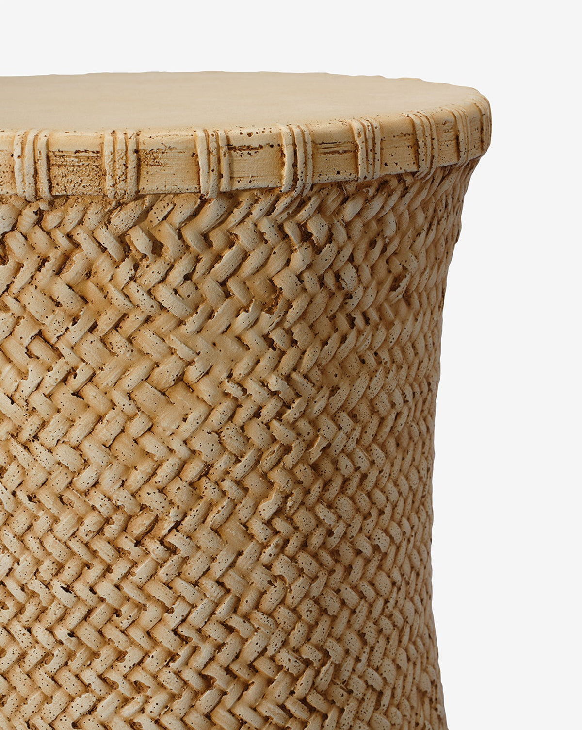 A close-up of the Made Goods Keira Stool highlights its tan and beige cylindrical basket weave texture and solid flat top, adding a rustic touch against a plain white background, McGee & Co.