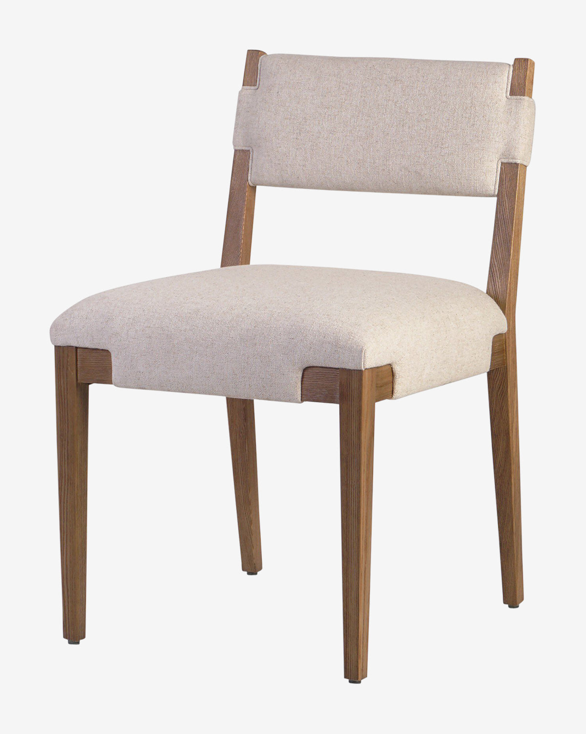 The Kennebec Dining Chair features a modern ash frame, padded beige seat and backrest in light performance fabric, and boasts clean lines with a minimalist design by McGee & Co.