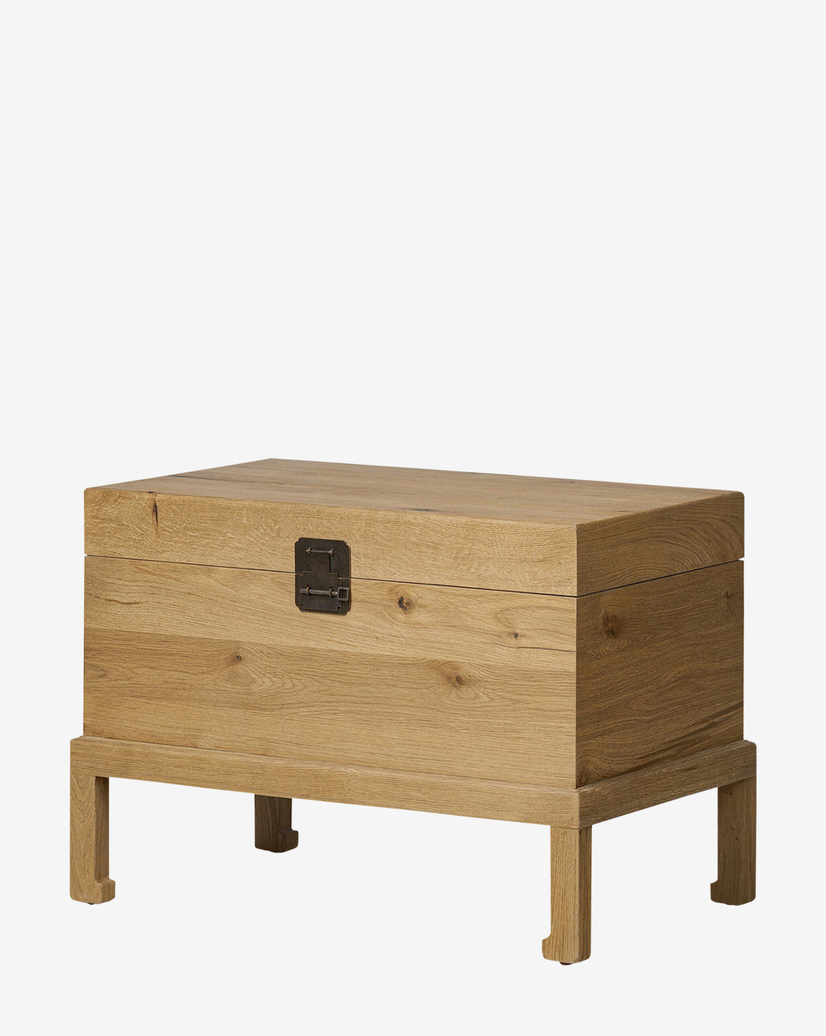 The Kenneth Bench is a simple, rustic rectangular storage chest made of light-colored wood, featuring a hinged lid, iron hardware, metal latch, and short legs by McGee & Co.