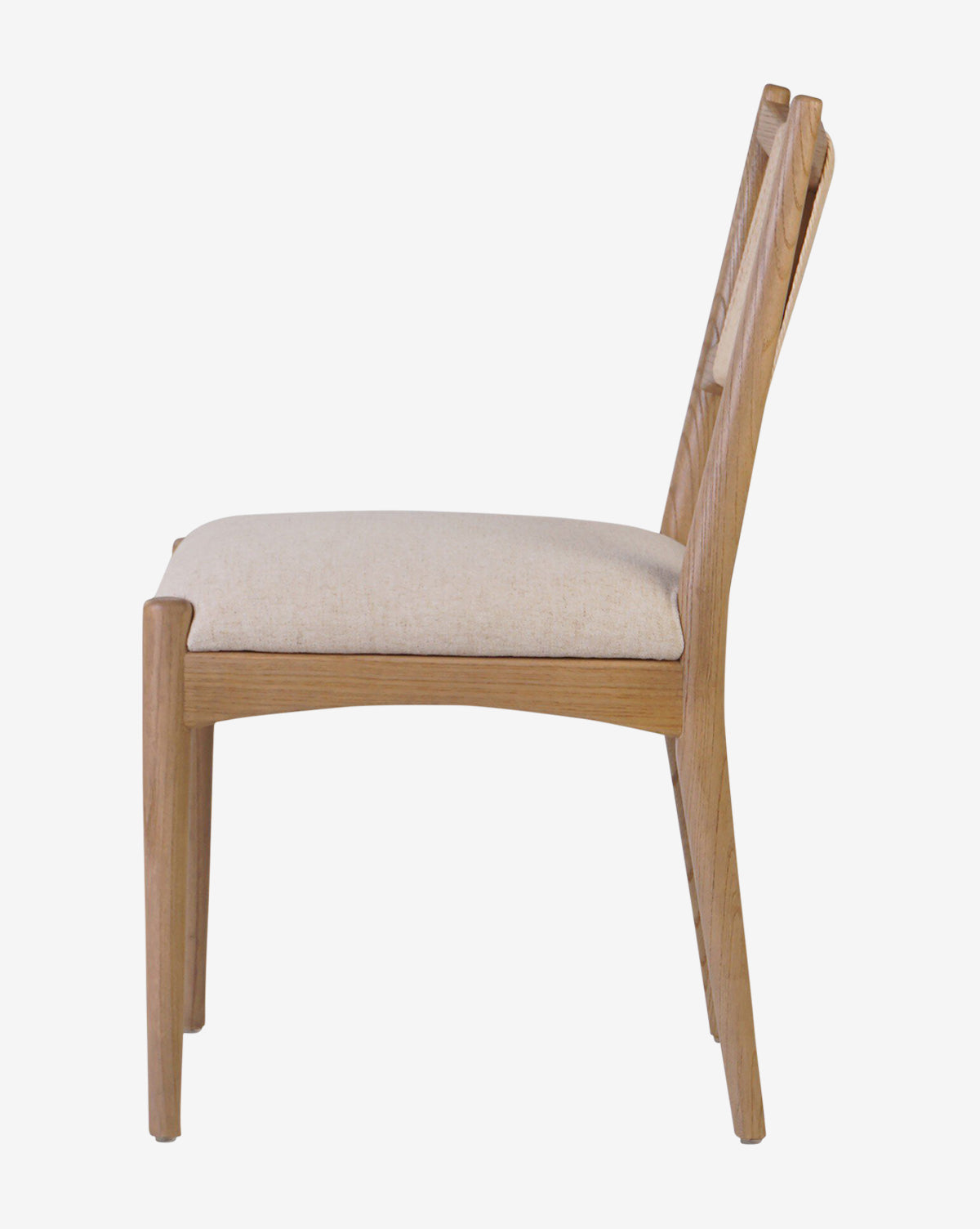 The Kimball Dining Chair features a sturdy wood frame, smooth clean lines, and a light beige upholstered seat in a minimalist design—shown in side profile view, it perfectly captures modern dining style, by McGee & Co.