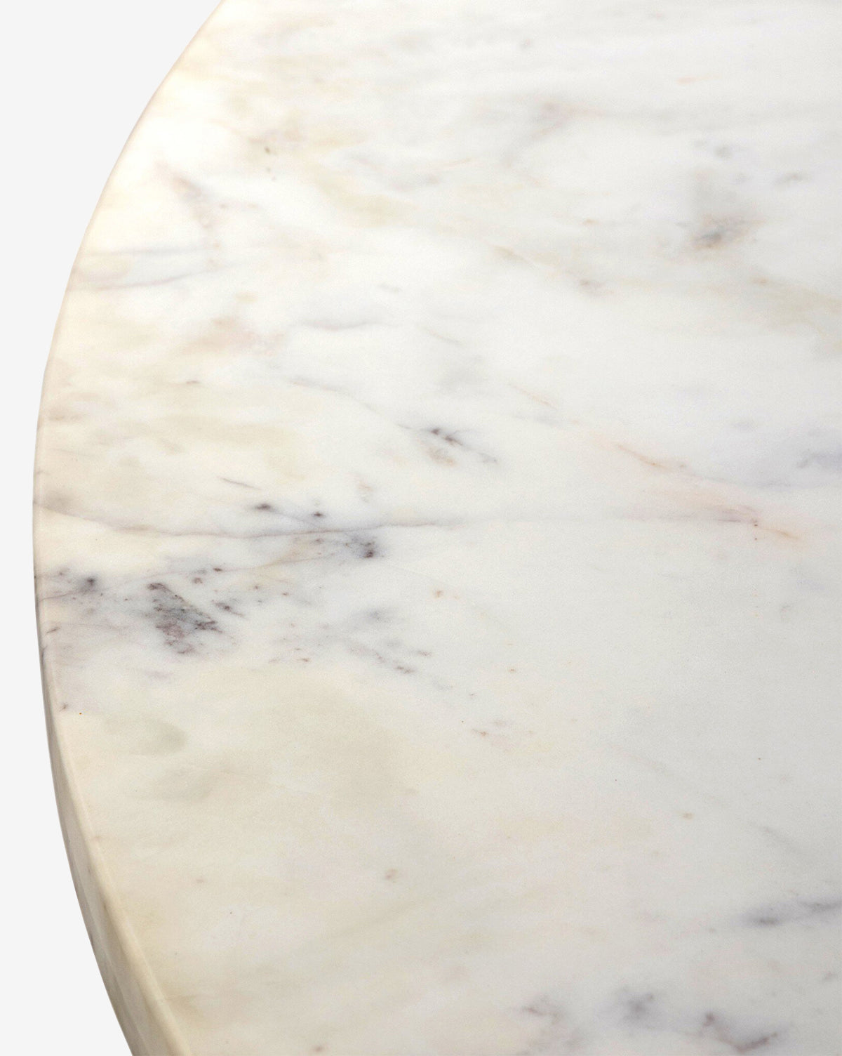 Close-up of the Kinlaw 60 Round Dining Table, featuring a white marble tabletop with subtle gray and beige veining, smooth surface, and polished edge, by McGee & Co.