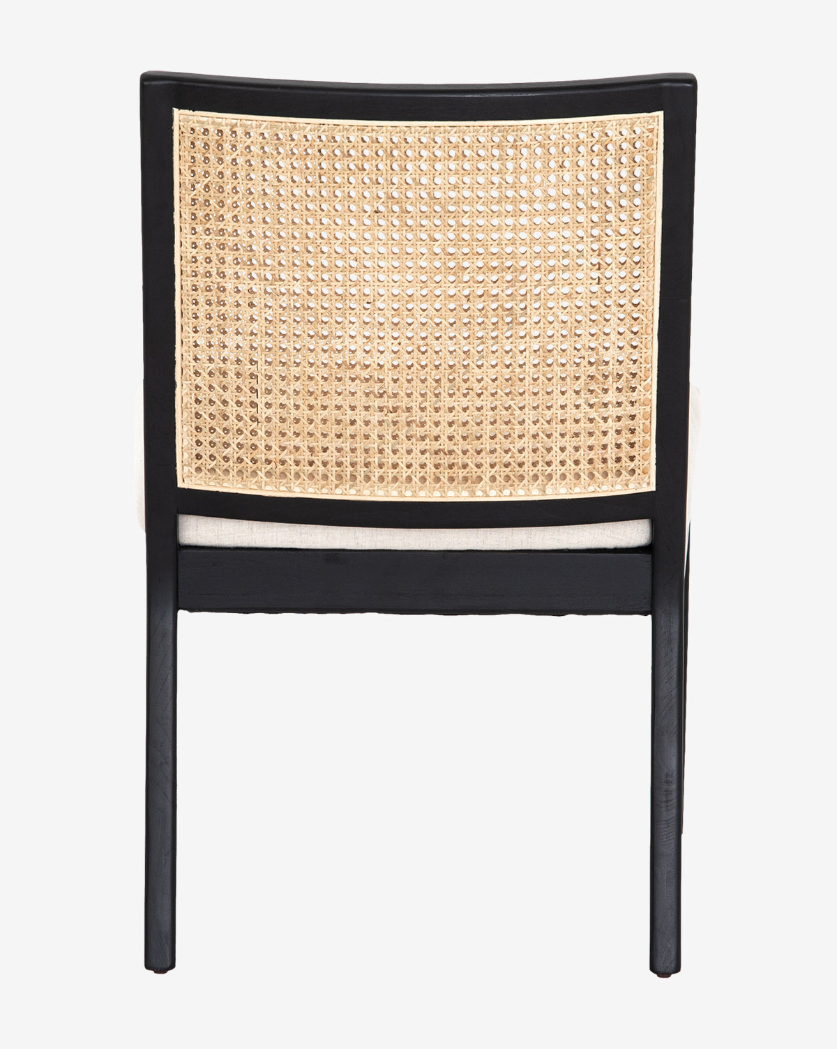 The Landon Dining Chair features a black wooden frame, cane back, and a light-colored high-performance fabric seat cushion for enhanced comfort and durability, by McGee & Co.