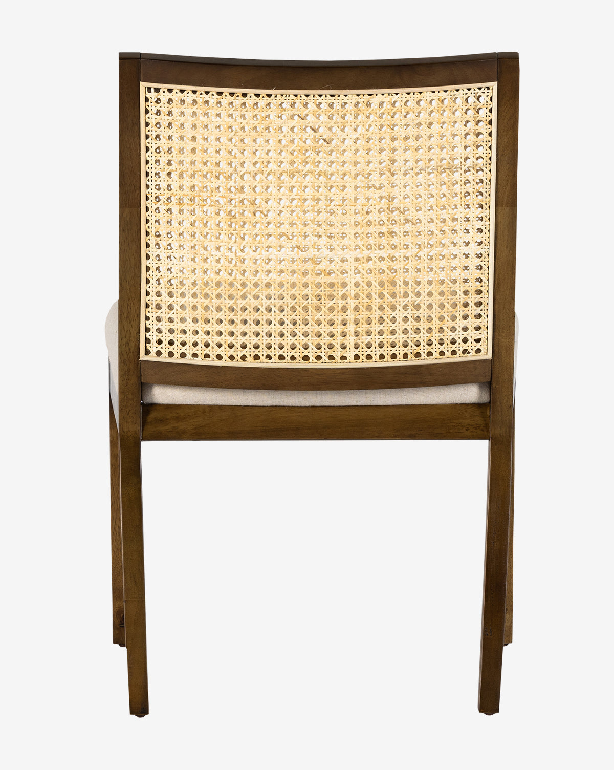 The Landon Dining Chair showcases a light brown cane back and beige cushioned seat upholstered in high-performance fabric, all styled on a white backdrop by McGee & Co.