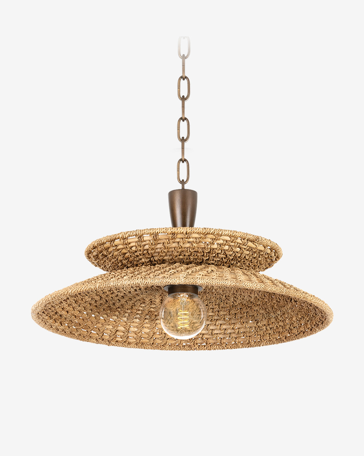 The Landry Pendant showcases two layered, round shades made of natural abaca and rattan, with an exposed bulb and a bronze hanging chain, presented against a plain white background, by McGee & Co.