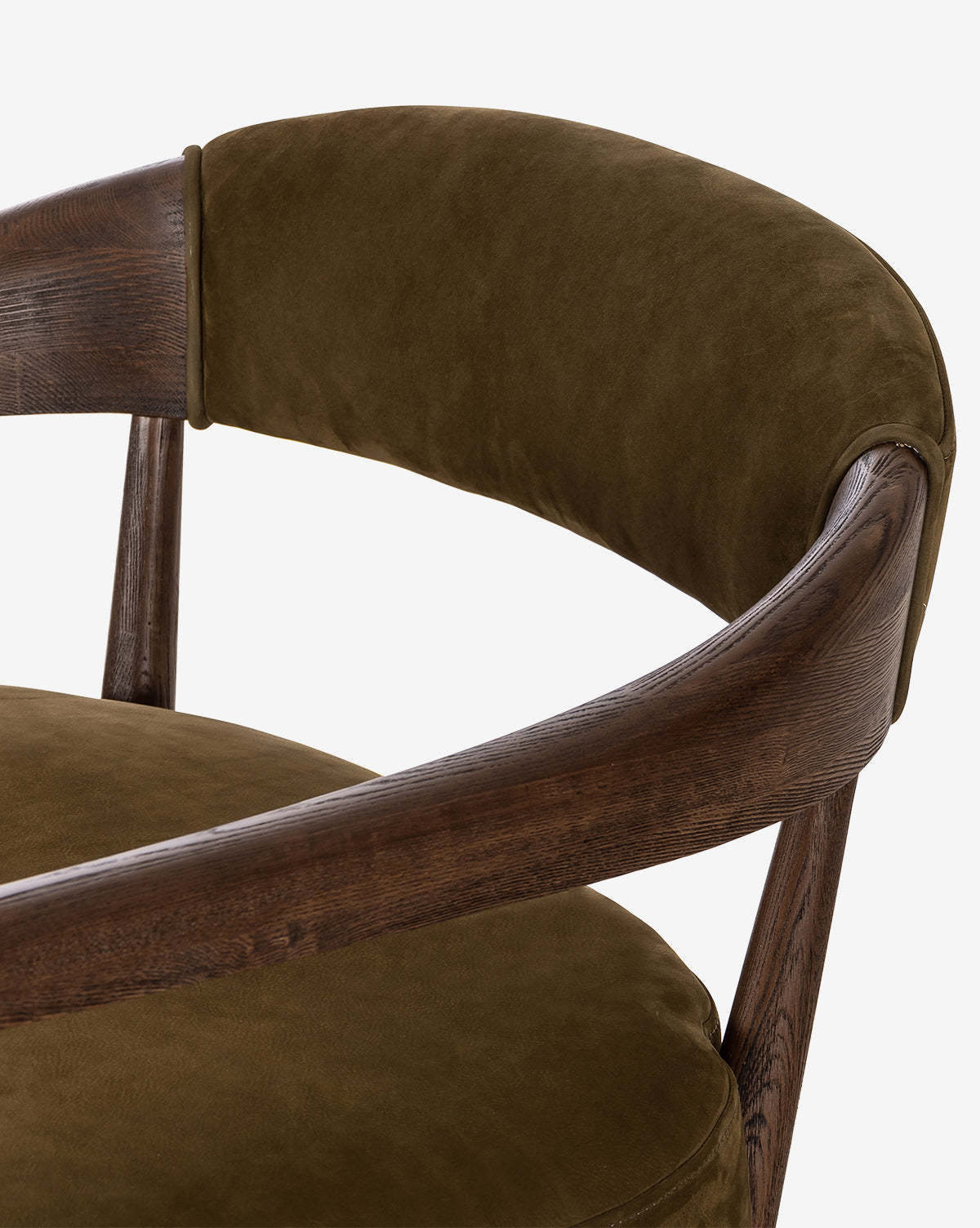 Close-up of the Larisa Lounge Chair, showcasing its curved solid ash frame and olive green top grain leather upholstery on both backrest and seat, displayed against a white background by McGee & Co.