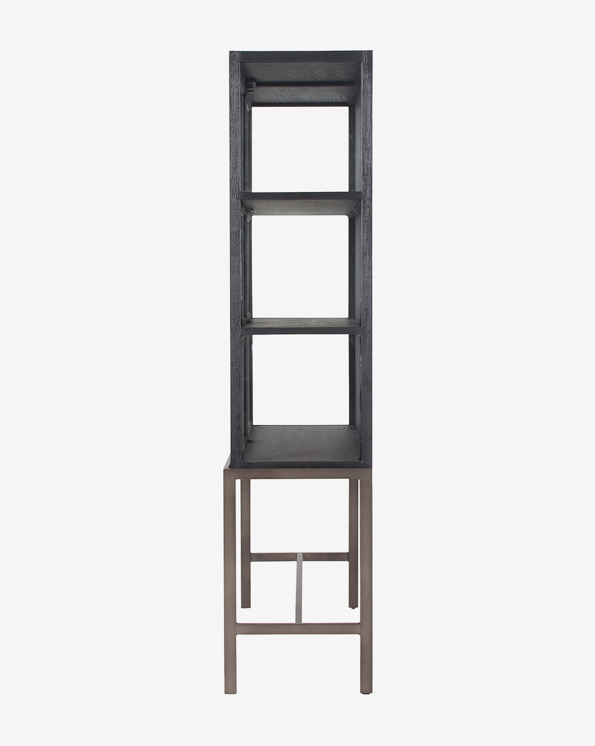 The Lawley Cabinet is a tall, narrow shelving unit in drift oak with three open shelves and a sturdy metal base, photographed against a plain white background by McGee & Co.