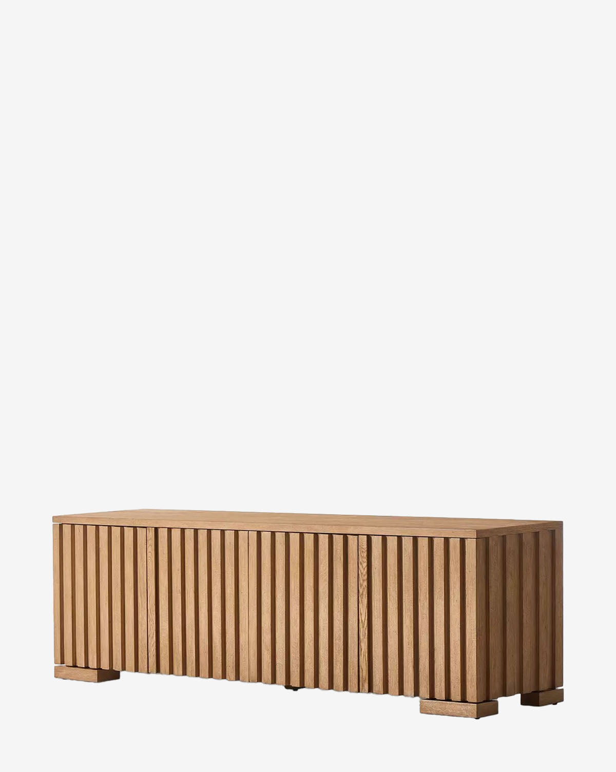 The Leith Console is a light brown oak TV stand with a minimalist design, featuring two open doors that reveal interior shelves and circular cable management cutouts, shown against a plain white background by McGee & Co.