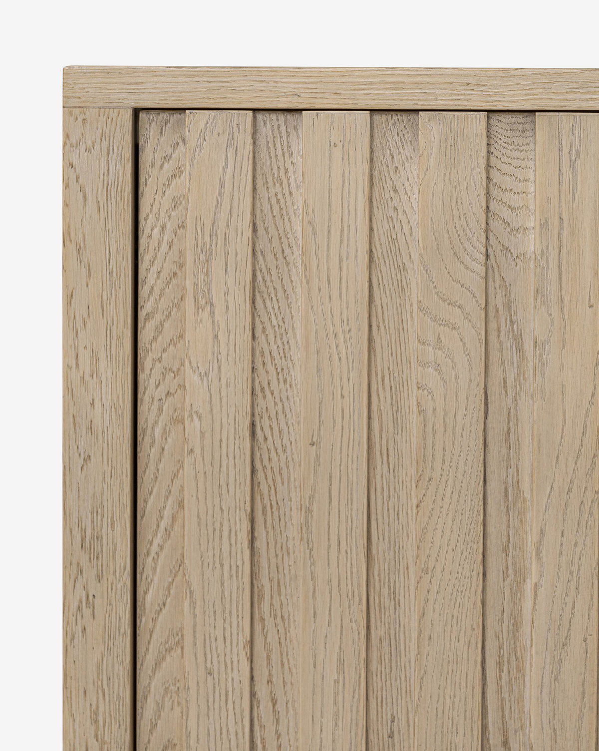 Close-up of the Leith Console’s wooden surface, featuring vertical slats in a natural light oak finish with visible wood grain—ideal for contemporary interiors, by McGee & Co.
