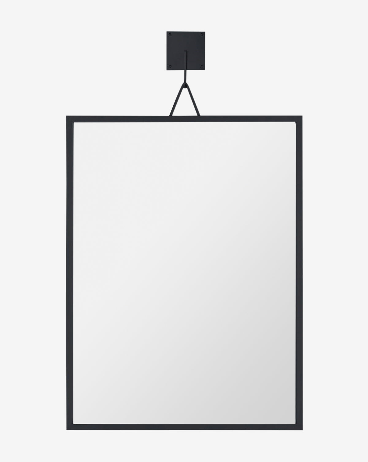 The Leonidas Wall Mirror is a modern decorative square wall mirror with a thin black frame, suspended by a single black strap from a square mount for an industrial look against plain white walls, by McGee & Co.
