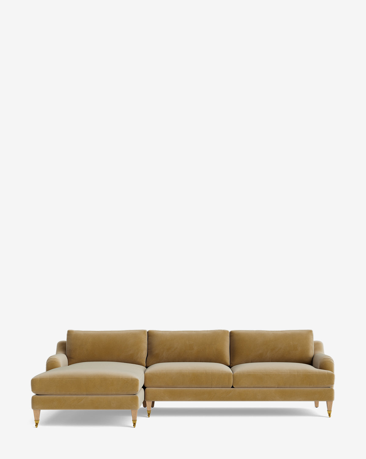 The Lucille English Roll Arm Left Chaise Sectional 107 is a mustard yellow velvet sofa with three seat cushions, a left-side chaise lounge, and wooden legs with gold caps, shown against a plain white background by McGee & Co.