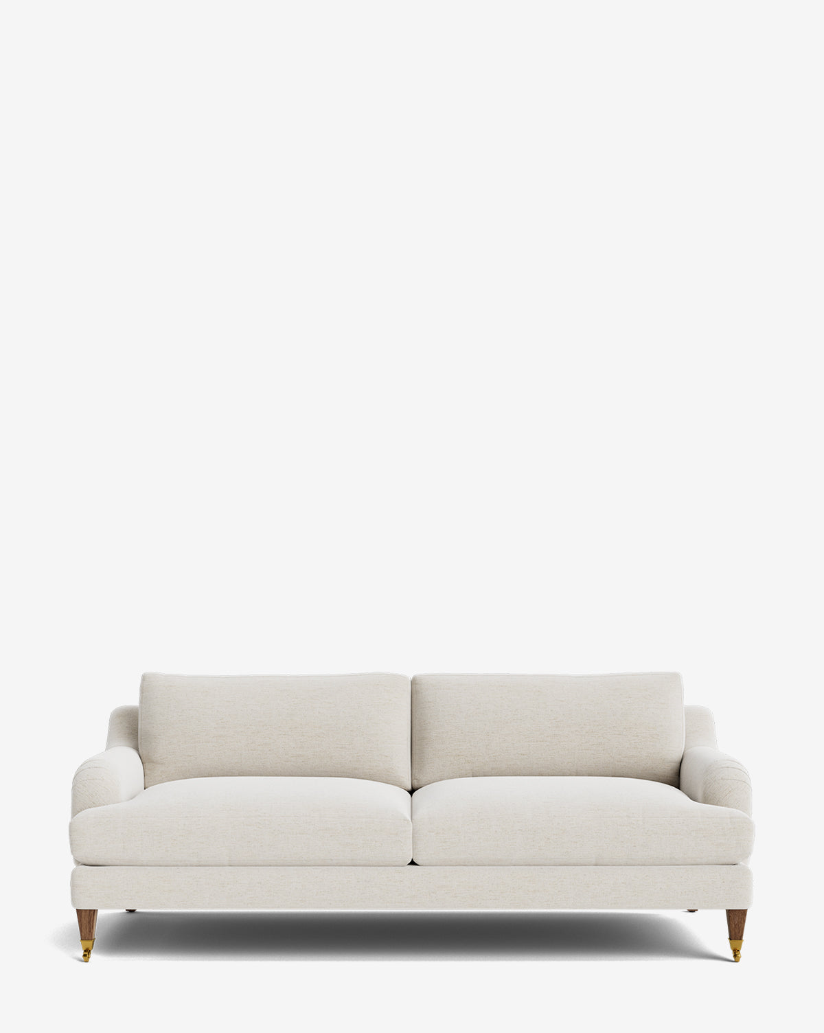 The Lucille English Roll Arm Sofa 78 is a modern, light beige sofa featuring two down-wrapped cushions, gently curved armrests, and four short wooden legs with brass caster wheels. Shown against a plain white background by McGee & Co.
