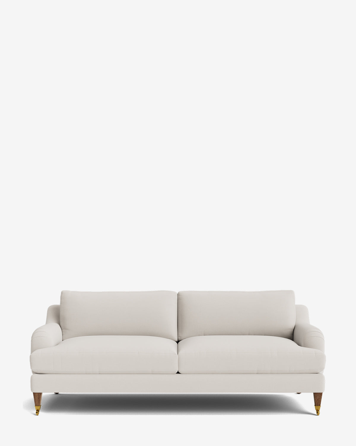 The Lucille English Roll Arm Sofa 78 features a modern, light beige design with down-wrapped seat cushions, two back cushions, and wooden legs with brass caps, shown against a plain white background by McGee & Co.