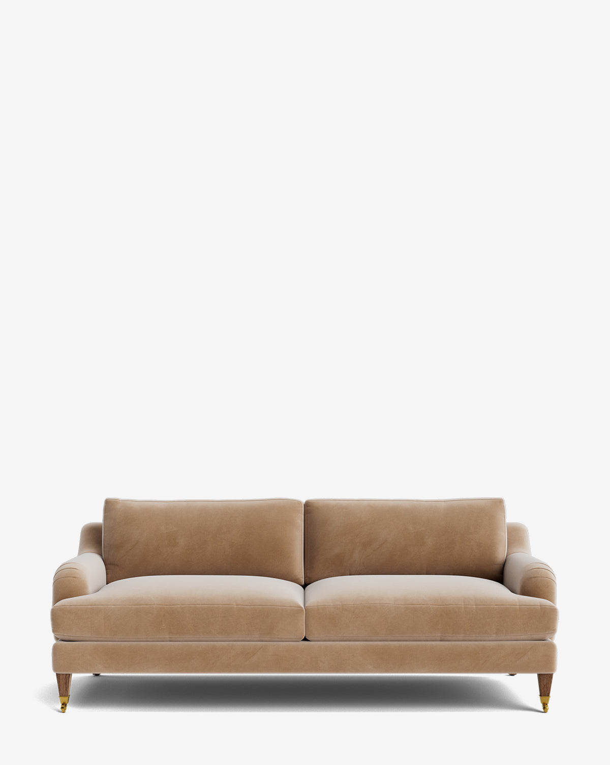 The Lucille English Roll Arm Sofa 78 features light brown velvet upholstery, down-wrapped seat and back cushions, and four wooden legs with brass casters, displayed against a plain white background by McGee & Co.