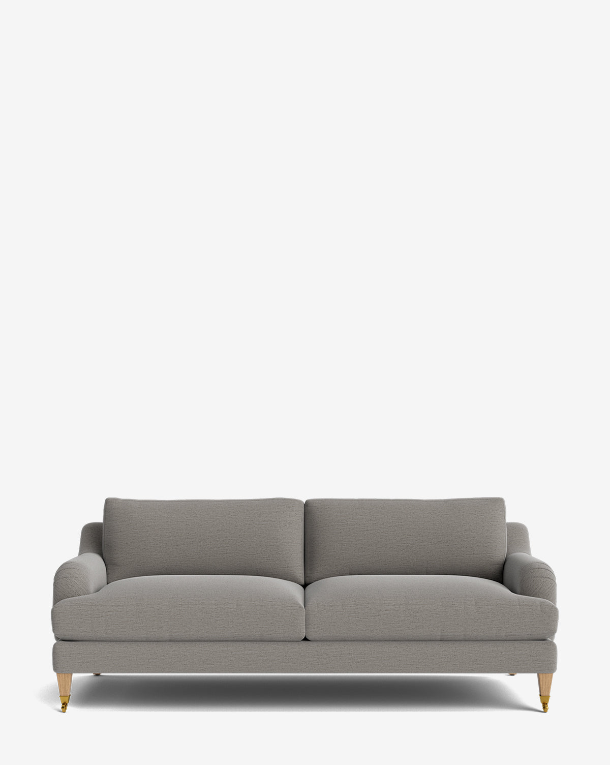 The Lucille English Roll Arm Sofa 78 is a modern grey customizable sofa with two down-wrapped seat cushions, two back cushions, rounded armrests, and four wooden legs with brass tips, shown on a plain white background by McGee & Co.