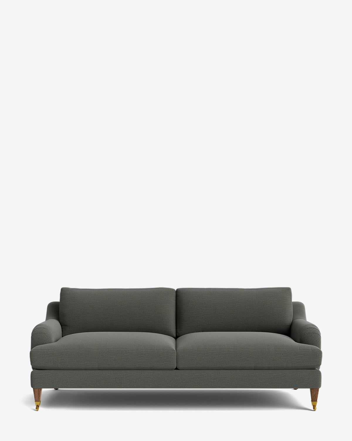 The Lucille English Roll Arm Sofa 78 features a dark gray, modern design with down-wrapped cushions, wooden legs, and brass castors on the front legs, shown against a plain white background by McGee & Co.