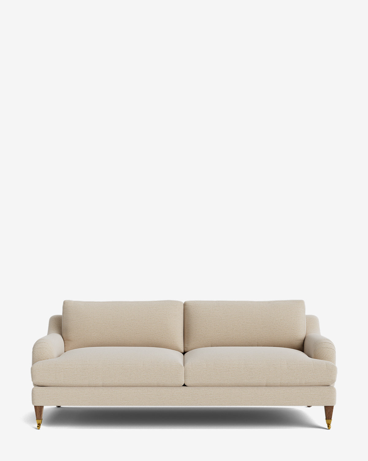 The Lucille English Roll Arm Sofa 78 is a customizable beige upholstered sofa with down-wrapped seat and back cushions and wooden legs with brass castors, shown on a plain white background by McGee & Co.