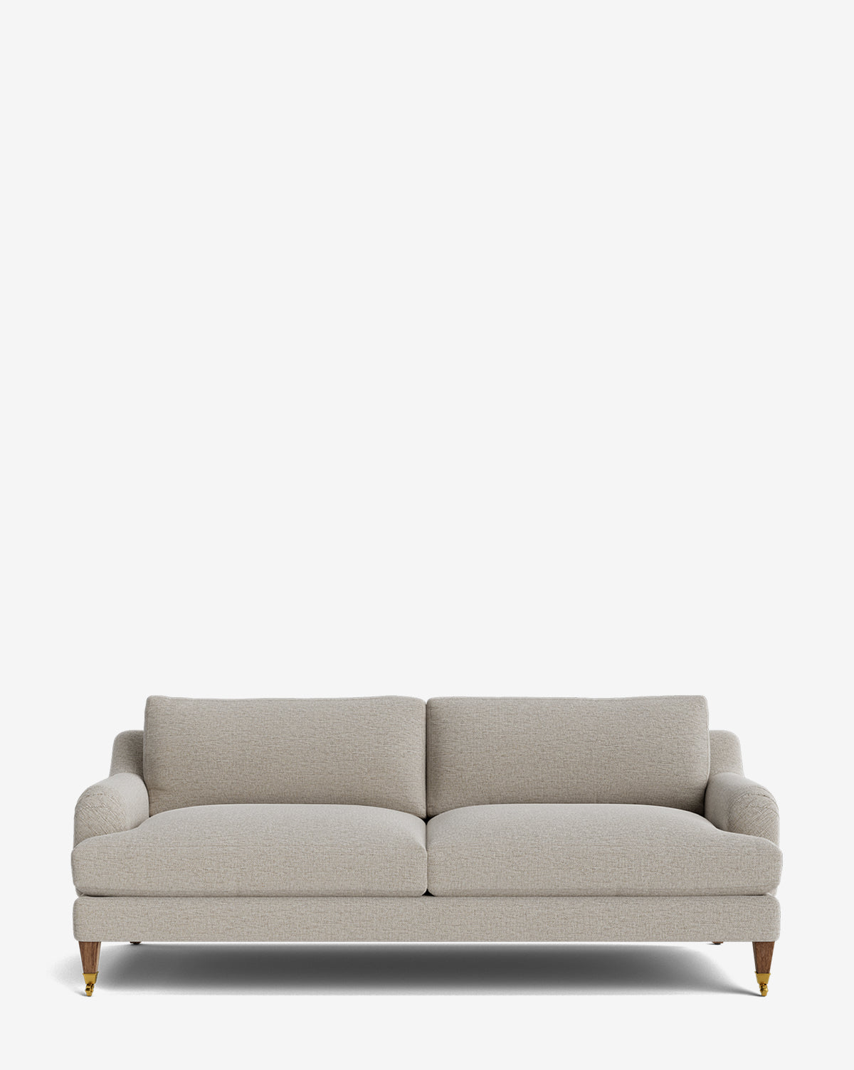The Lucille English Roll Arm Sofa 78 features light gray upholstery, down-wrapped seat and back cushions, low rounded arms, and short wooden legs with brass casters, displayed against a plain white background by McGee & Co.