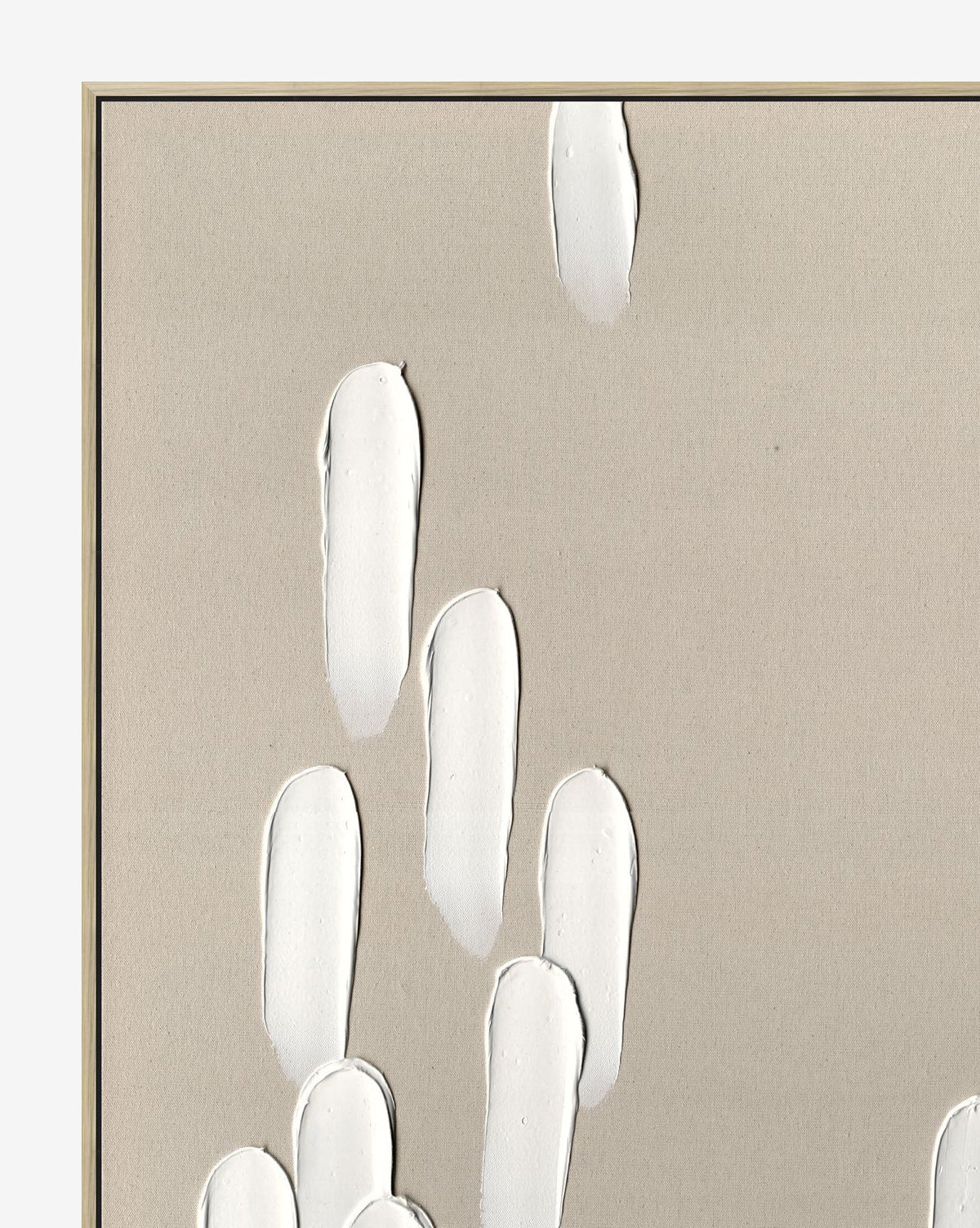 Neutral Cascade II is a minimalist abstract wall art piece, featuring textured white vertical dashes on a beige canvas and finished with a slim woodgrain frame for an understated look.