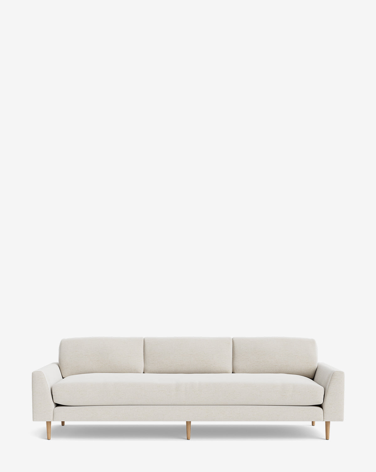 The Test Product Test Sofa features a modern, minimalist mid-century design in light beige, with three seat and back cushions plus wooden legs, shown against a plain white background by McGee & Co.