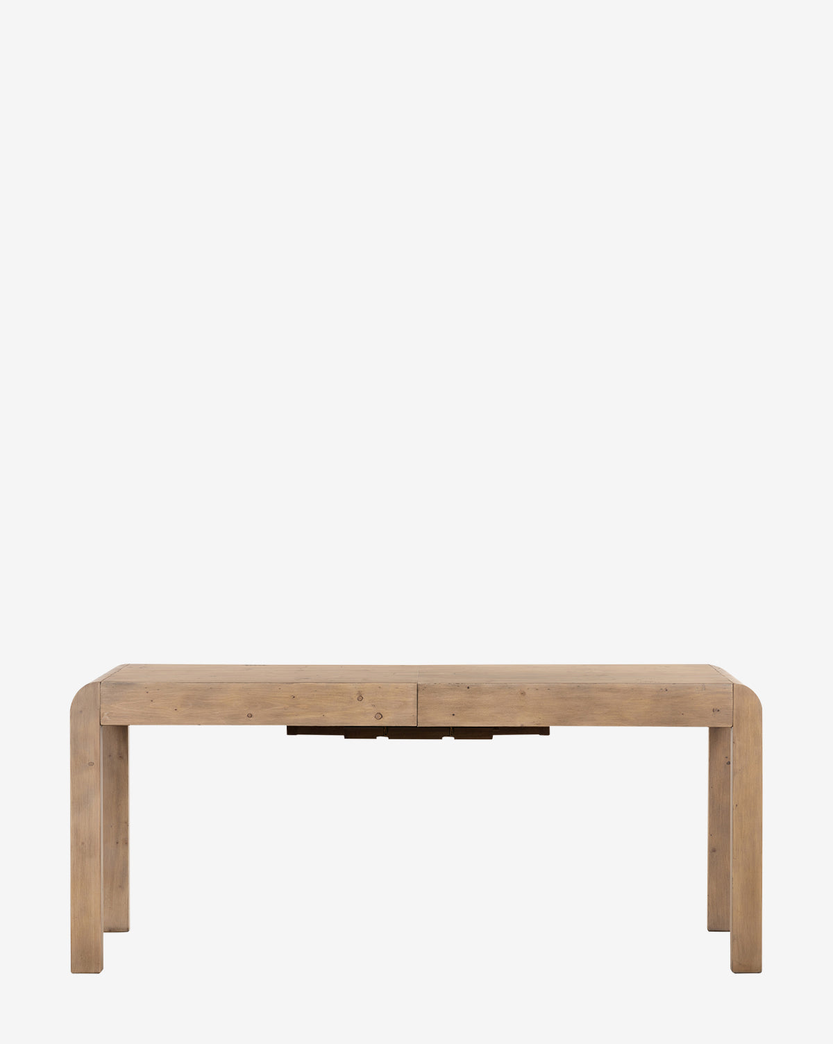 The Elisha Extension Dining Table is a rectangular reclaimed wood table with rounded edges, sturdy legs, and a natural finish. Shown against a plain white background, its minimalist design fits perfectly into any modern space by McGee & Co.