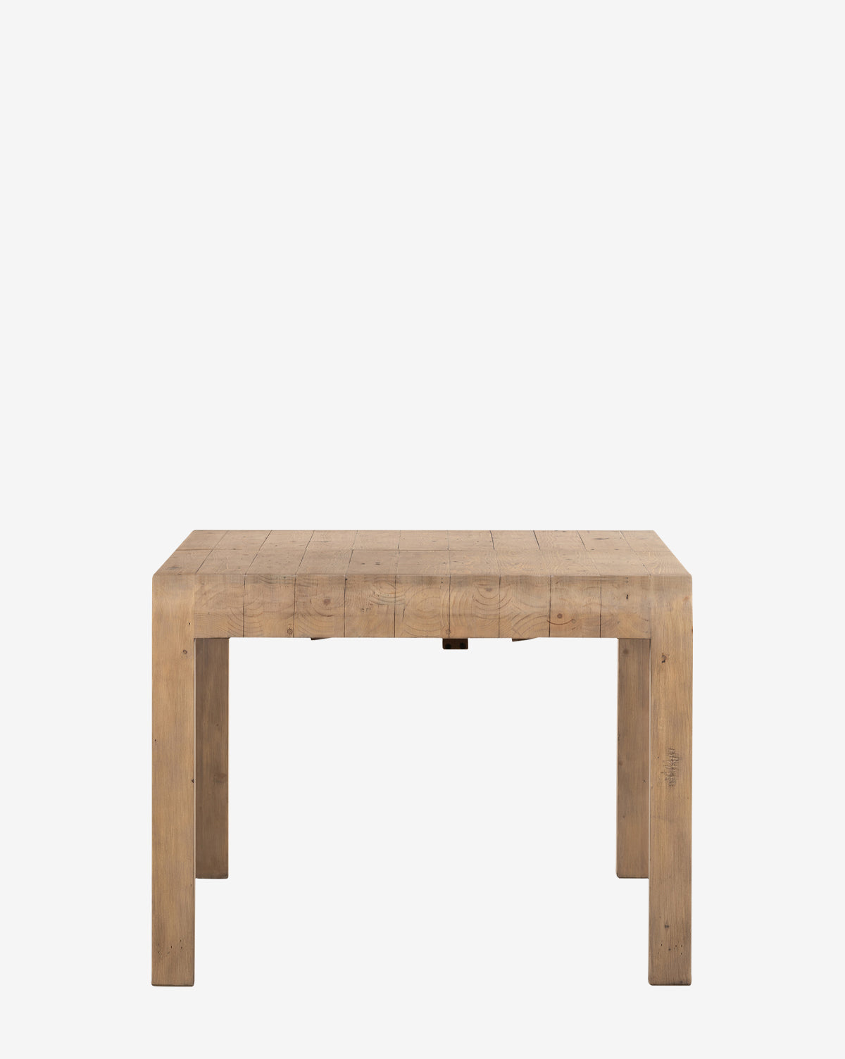 The Elisha Extension Dining Table is a sturdy, wooden rectangular table with thick legs and a smooth, flat surface, shown in the photo against a plain white background by McGee & Co.