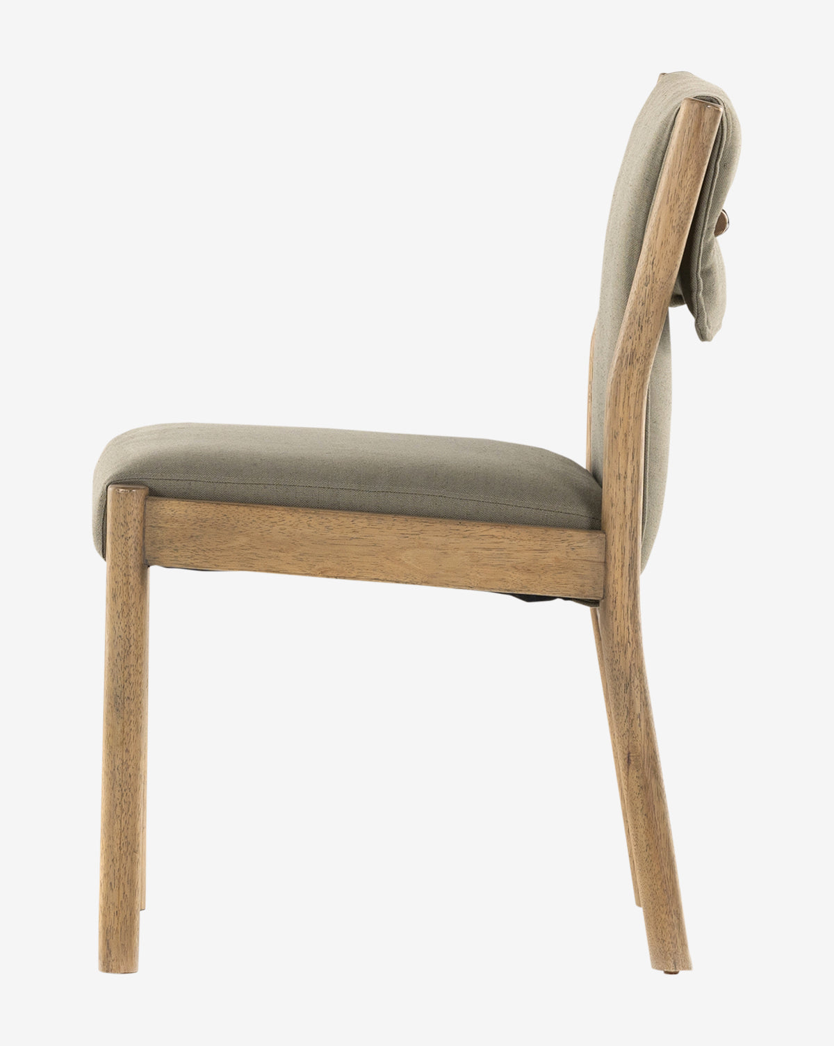 Side view of the Bardot Dining Chair, featuring a light brown parawood frame and legs, plus cushioned seat and back upholstered in durable light gray fabric. Simple, modern design, by McGee & Co.