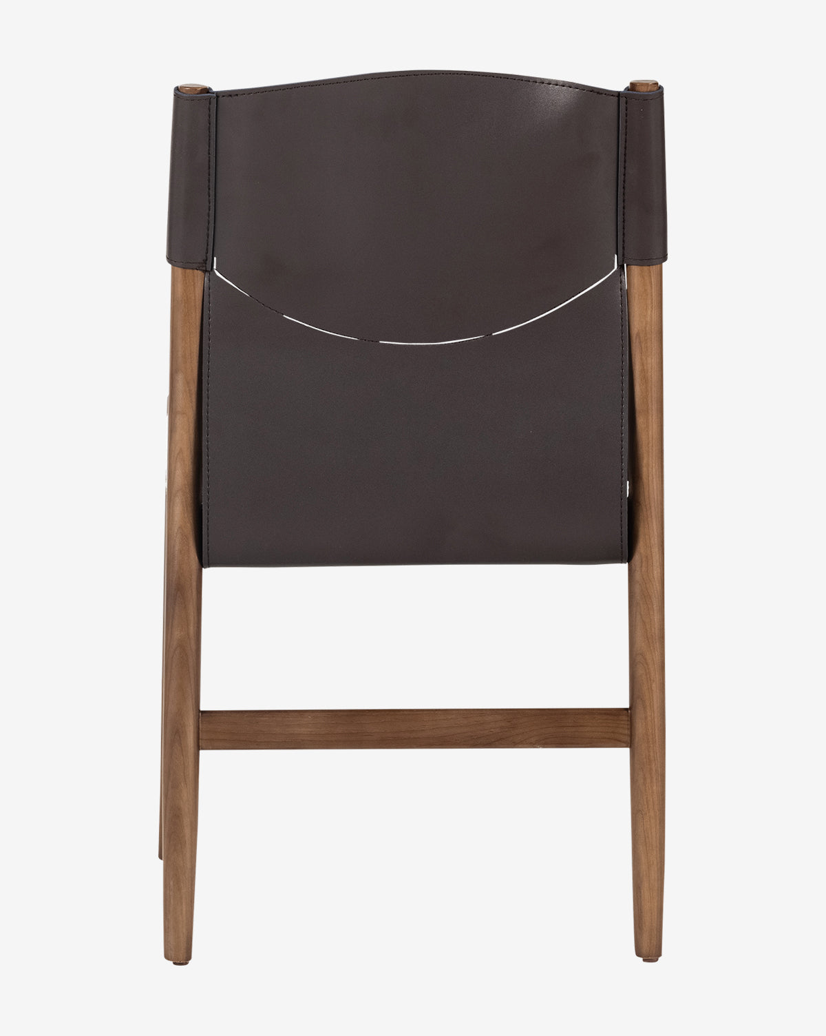 The Kelby Dining Chair has an espresso leather backrest and seat with an ash wood frame and angled legs, shown from the back, by McGee & Co.