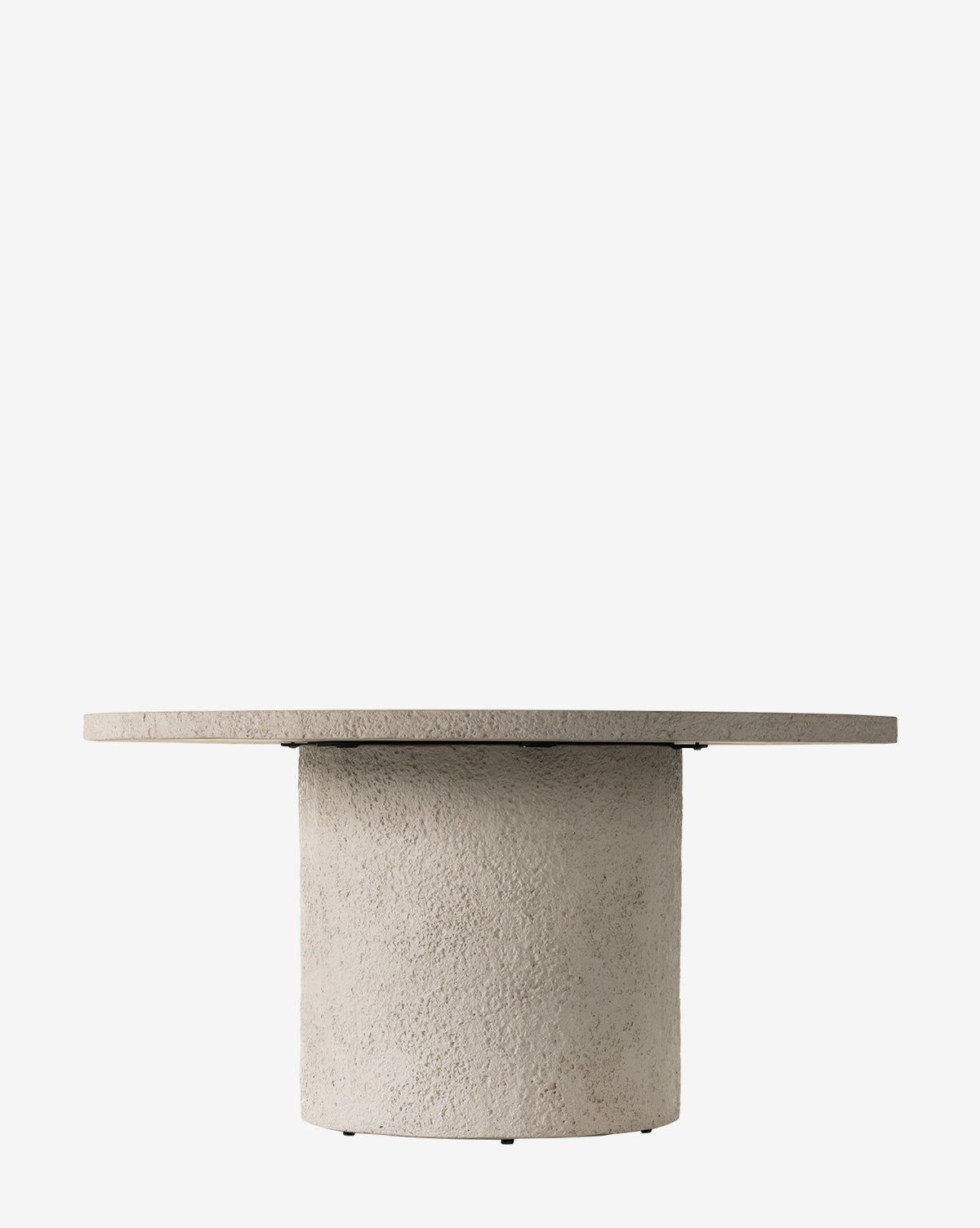 The Atalanta Outdoor Dining Table is a round, light gray concrete piece featuring a thick cylindrical base and flat, wide top, shown against a plain white background by McGee & Co.